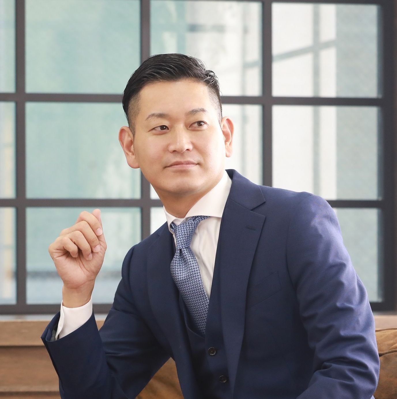 株式会社クオレガ 代表取締役 佐藤 康成